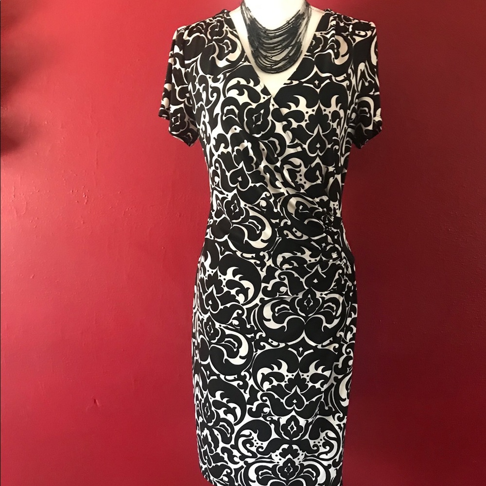 Slimming black and white wrap dress.  Sz. 14